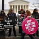 Protesters on both sides of the abortion issue gather in front of the U.S. Supreme Court building during a a rally and protest in January 2019 in Washington, D.C.